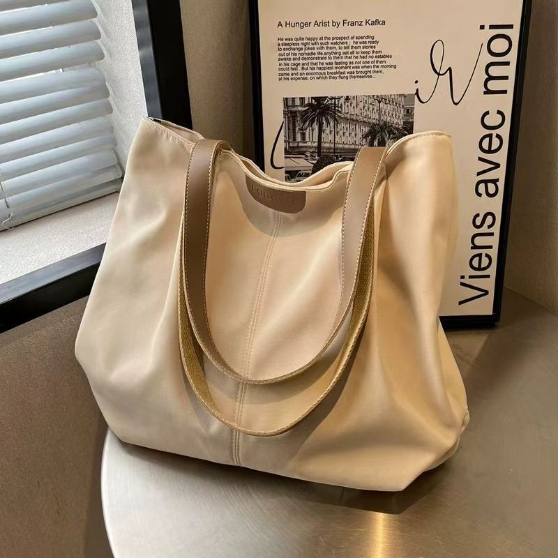 2025 New Large Capacity, Simple, Multi functional, Versatile College Student Handbag, Commuter Shoulder Bag, High end Design, Fashion Shopping Bag