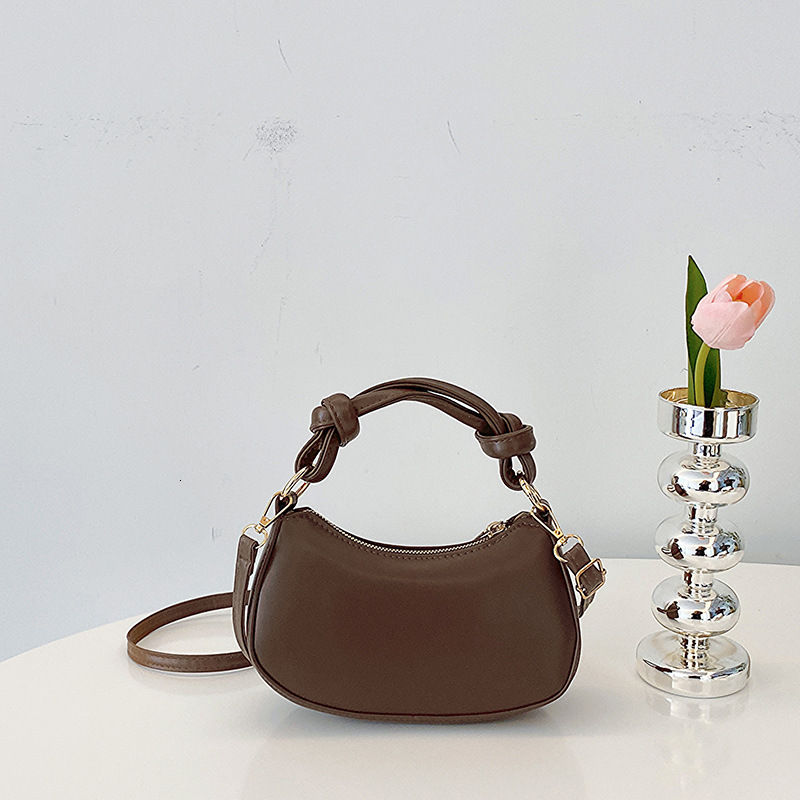 Free Delivery Designer Bag This Year's Trendy Versatile Internet Celebrity Solid Color Knotted Hand 2025 Autumn And Winter New Korean Version Cro