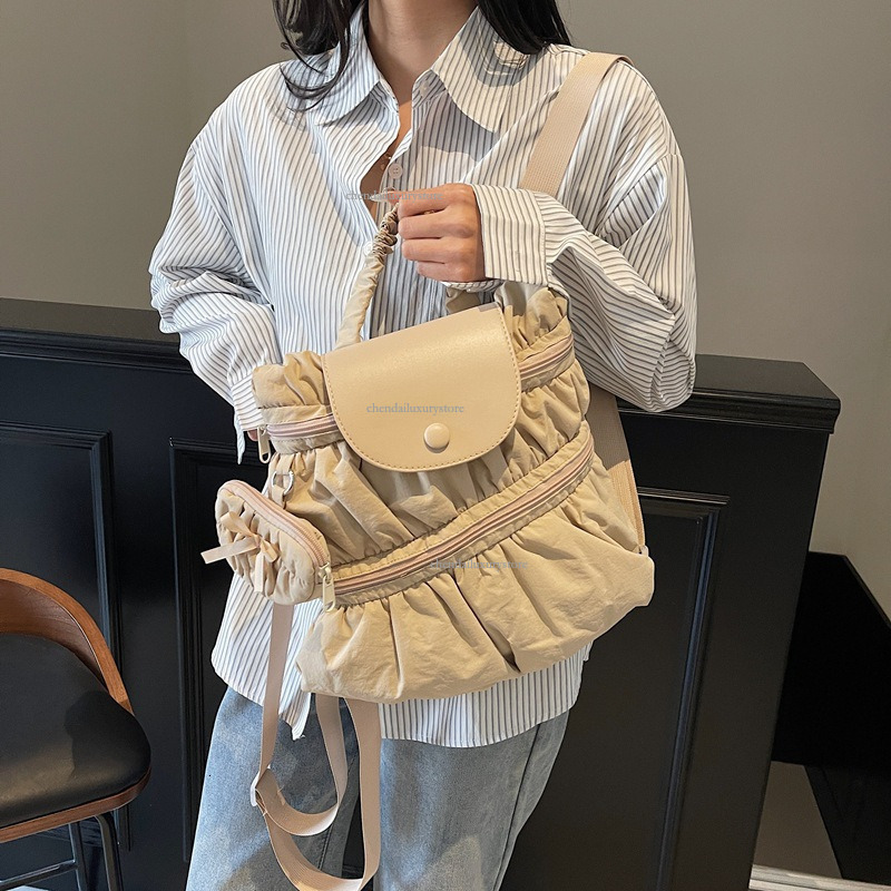 2025 Free Shipping Designer Bag Women's Backpack Sweet And Fashionable Pleated Skirt Handbag Campus Student Backpack Outdoor Travel Vacation Back