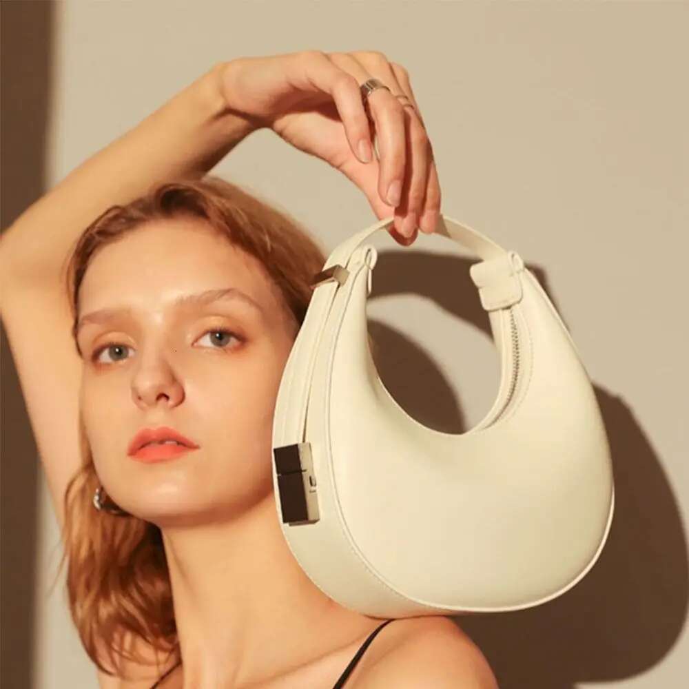 2025 New Bag Creative Half Moon Bag Minimalist Style Designer Women's Shoulder High End Underarm Handbag Fashion Handbag Versatile Trendy Saddle 