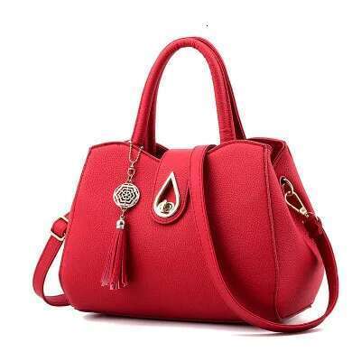 Simple women's fashion casual handbag large capacity fringed decorative shoulder messenger bag