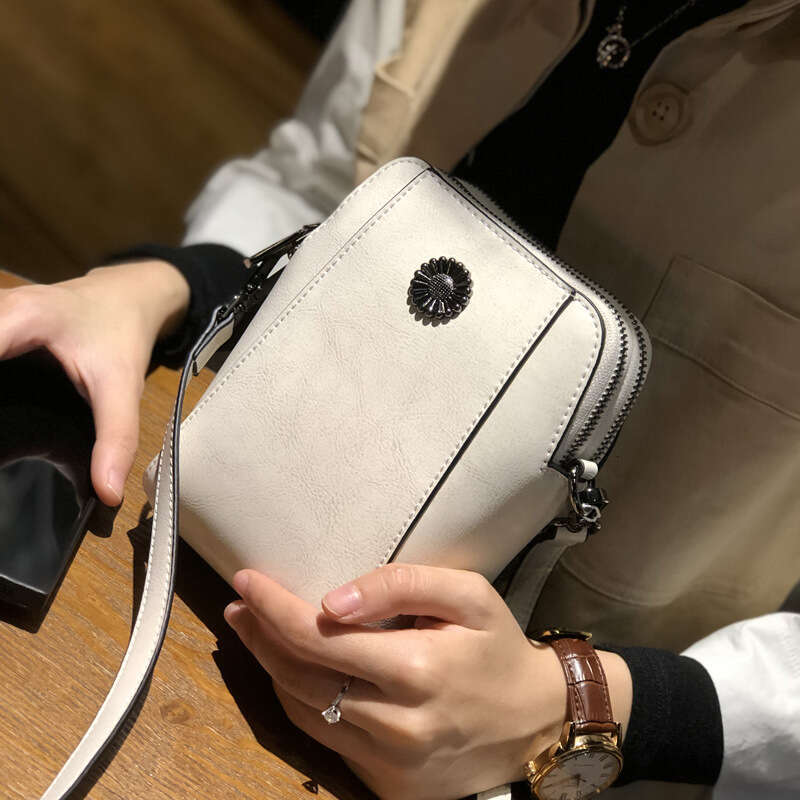Cowhide small crossbody 2025 popular phone women's niche high-end sense shoulder bag, trendy temperament, versatile new trend ins