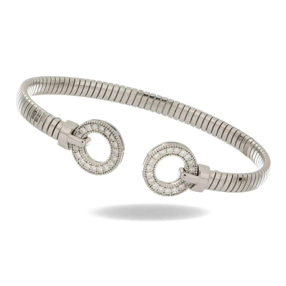 Made Italy, this elegant sier cuffed bracelet features circular micro paving details and is handmade in a modern style