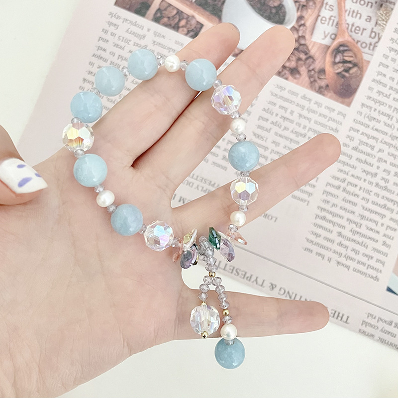 Minimalist navy blue stone women's temperament fashionable pearl pendant with adjustable elasticity 14K electroplating bracelet
