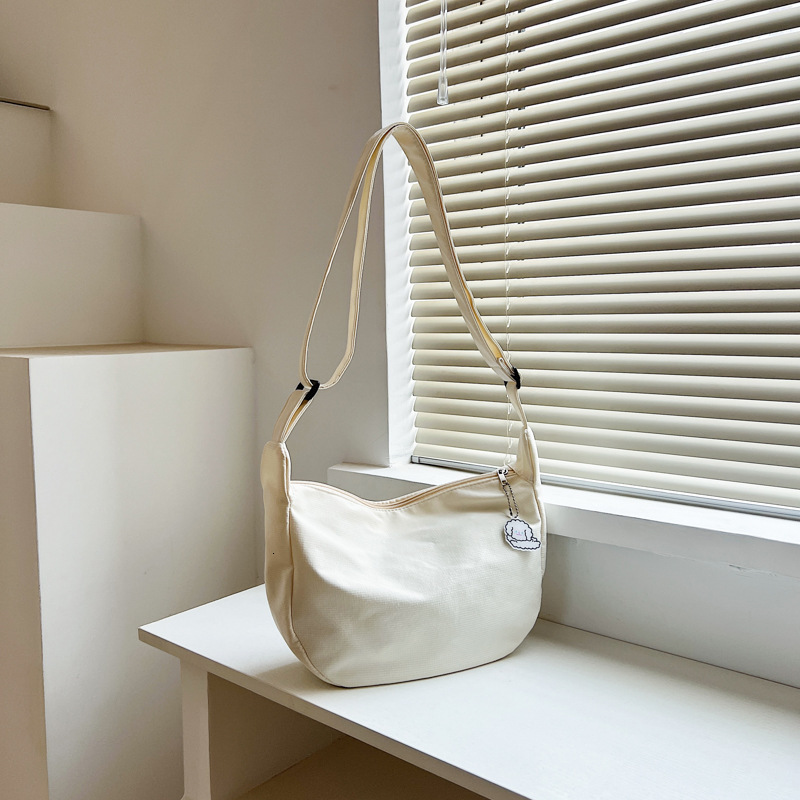Free Delivery Designer Bag 2025 Chic Girls Solid Color Soft Girl Shoulder Bag Korean Version Chaoins Simple Crossbody Dumpling Bun Luxury Bag