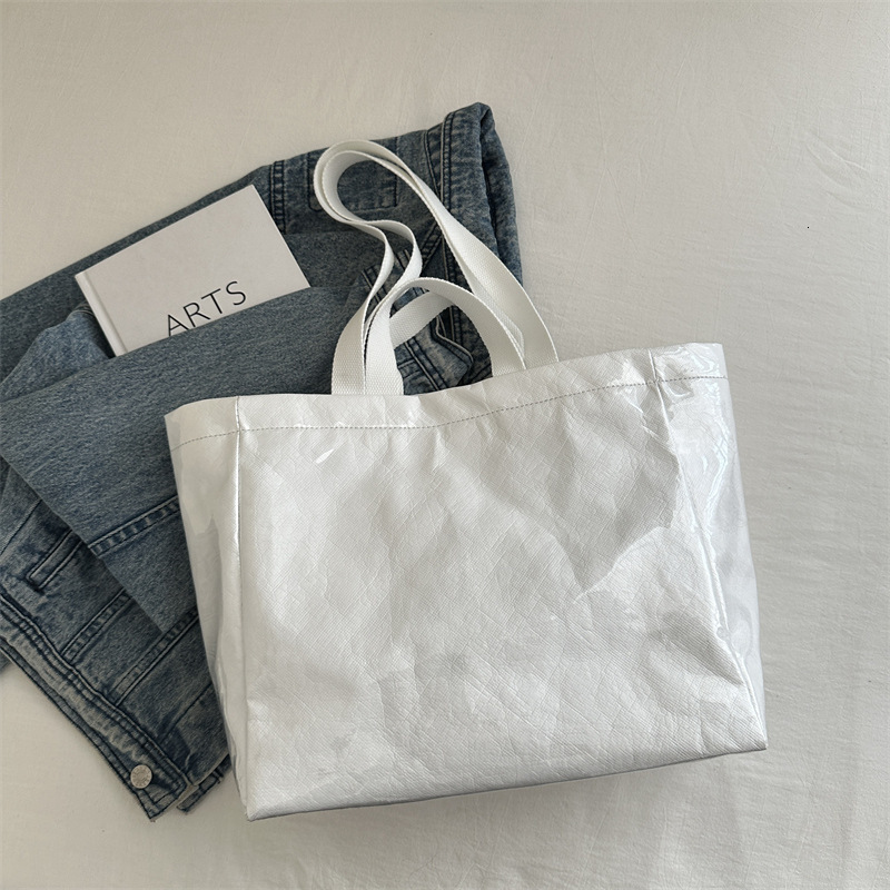 2025 New free delivery designer's bag DuPont Paper Jelly Tote Large Capacity PVC Waterproof Handbag Commuter Mommy Single Shoulder Bag