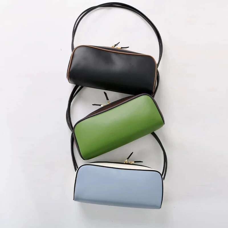 2025 Brand Genuine Leather Portable Bowling Women's Super Fire Color Splicing Advanced Sense Shoulder Commuter Underarm Bag