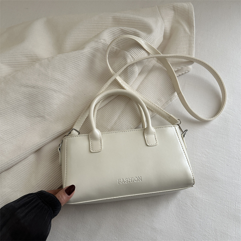Minimally Handheld Small Square 2025 Spring And Summer New Style New Free Delivery Designer Bag High End Luxury Bag Fashion Shoulder Korean Edition Ni