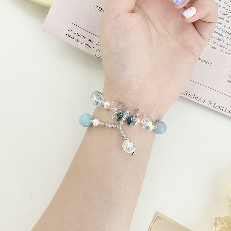 Minimalist navy blue stone women's temperament fashionable pearl pendant with adjustable elasticity 14K electroplating bracelet