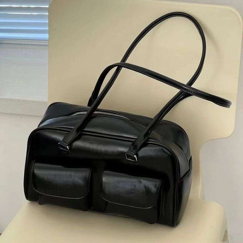 2025 niche design oil wax leather bowling with multiple pockets casual armpit bag commuting hand-held shoulder bag