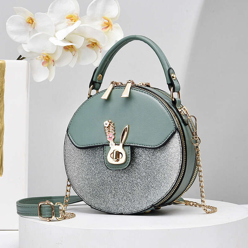 2025 new internet celebrity chain contrasting small round mini hand-held shoulder bag, diagonal cross women's bag