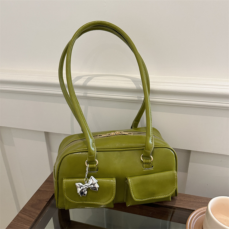 American Fashion Handheld Bowling 2025 New Fashionable Versatile Shoulder High Beauty New Free Delivery Luxury Bag Designer Bag Casual Women's Ba