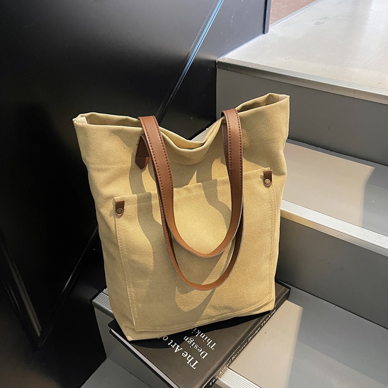 Canvas men's large capacity handheld 2025 new fashion spring simple shoulder bag versatile casual tote for women