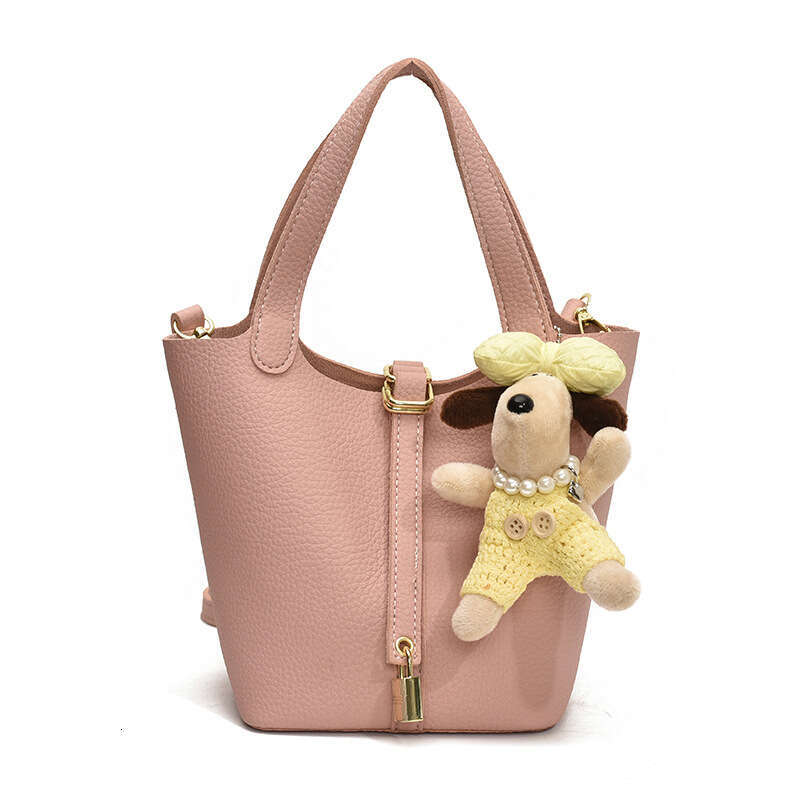 Fashionable Western vegetable basket water bucket for women 2025 solid color lychee pattern niche single shoulder crossbody bag new style temperament 