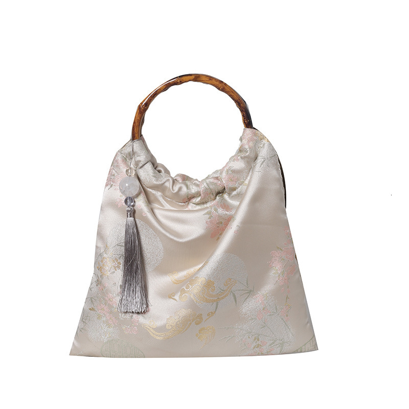 2025 new bag, new Chinese style horse face skirt, qipao, Hanfu, ancient rattan weaving, hand-held bamboo designer, ethnic style, handmade jacquard bag