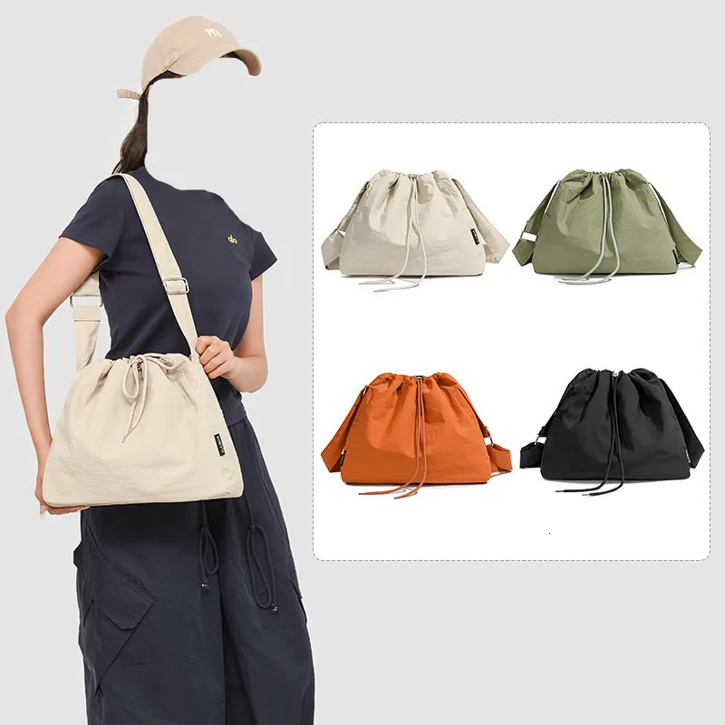Large capacity drawstring sports wind dumpling bag lightweight small niche tote commuting versatile shoulder crossb 250514