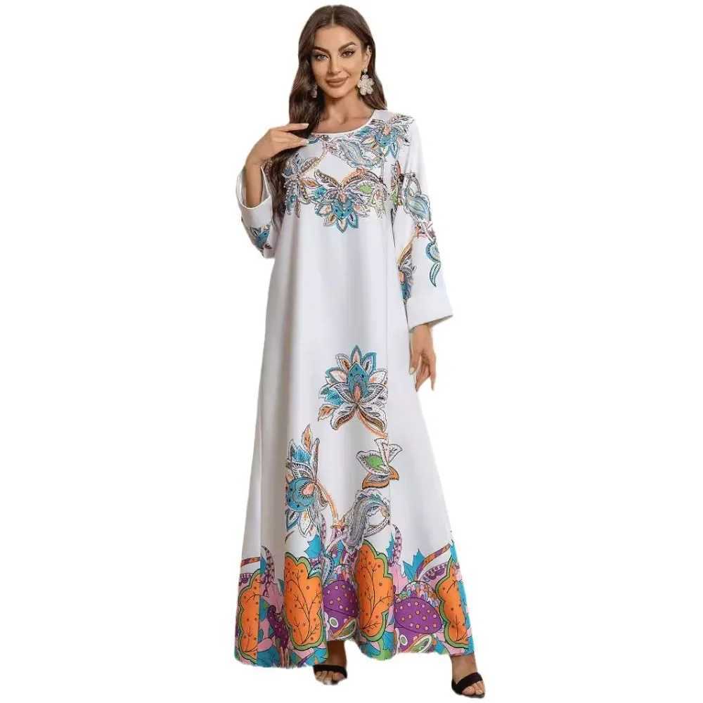 Turkish Muslim ladies elegant abaya It is a new-style printed V-neck dress from Dubai Arabia adorned with dded beads X250514