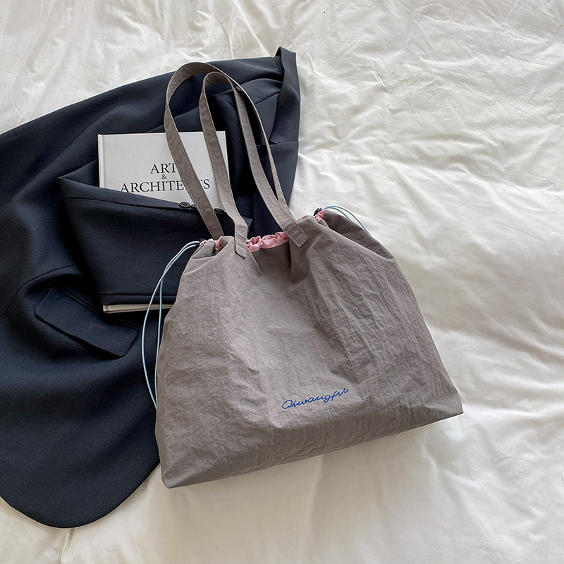 Casual Simple Canvas 2025 Spring And Summer New Free Delivery Designer Luxury Bag Bag Large Capacity Korean Edition Tote Fashion Trend Shoulder Bag Fo