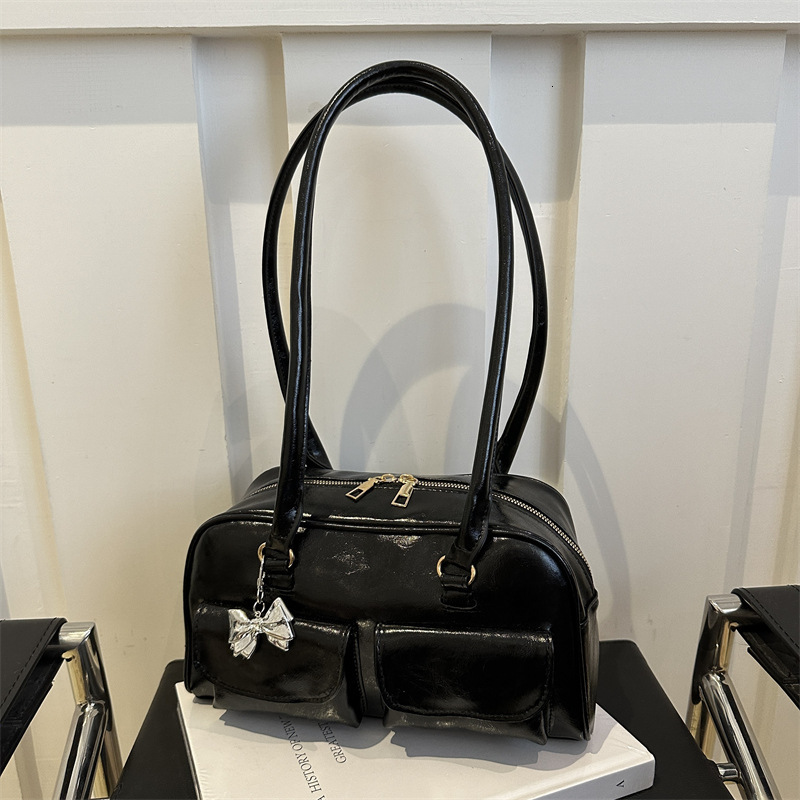 American Fashion Handheld Bowling 2025 New Fashionable Versatile Shoulder High Beauty New Free Delivery Luxury Bag Designer Bag Casual Women's Ba