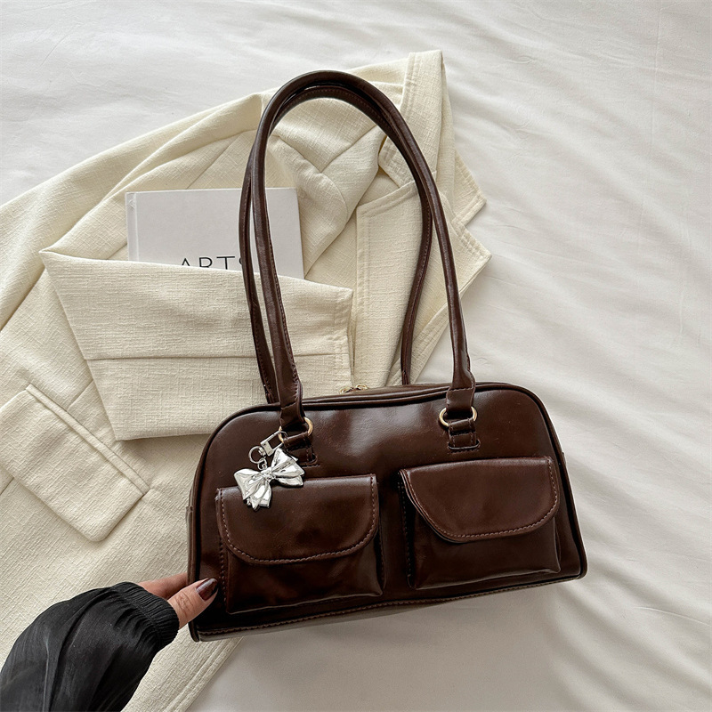 American Fashion Handheld Bowling 2025 New Fashionable Versatile Shoulder High Beauty New Free Delivery Luxury Bag Designer Bag Casual Women's Ba