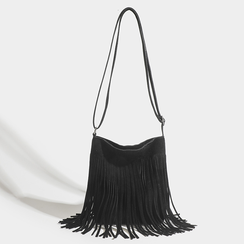 2025 New American Bohemian Tassel Classic Fashion Designer Multi functional Advanced Retro Versatile Saddle Thai Cool and Spicy Crossbody Bag Underarm