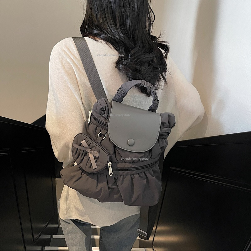 2025 Free Shipping Designer Bag Women's Backpack Sweet And Fashionable Pleated Skirt Handbag Campus Student Backpack Outdoor Travel Vacation Back
