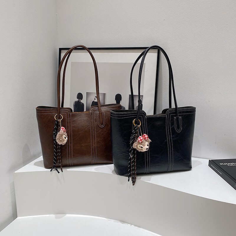 2025 new bag, women's simple large capacity, 2025 new multifunctional shoulder designer bag, college student class bag, commuting handbag, undera