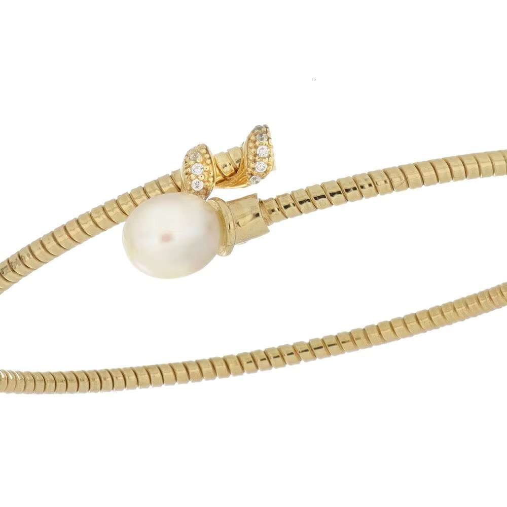 An old bracelet made in Italy, featuring sparkling pearls and exquisite paving details