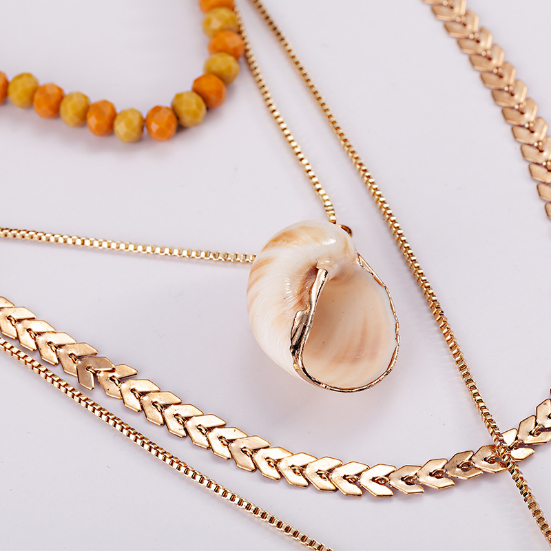 Multiple sets of snail shell crystal chain necklaces for direct sale