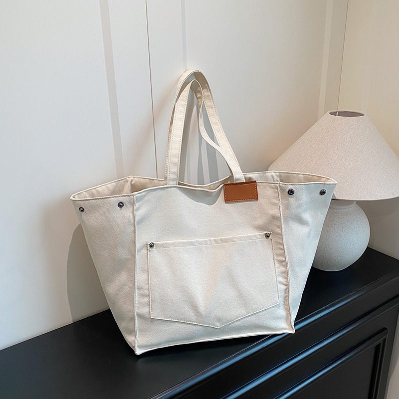 Fashion New Free Delivery Designer Luxury Bag Bag Canvas Handbag Women's Large Capacity Casual Shoulder Commuting Bag