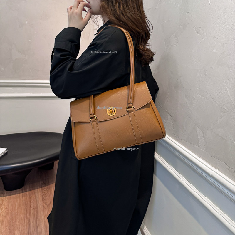 2025 Free Shipping Designer Bag Women's Fashionable New Business Briefcase Handbag Urban Simple Leisure Large Capacity Shoulder Bag Vacation Trav