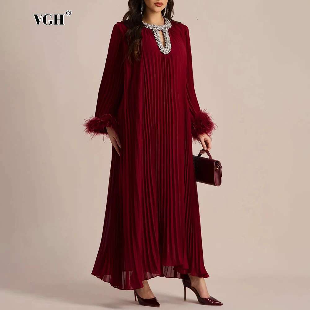 VGH Solid Spliced Dias tail Dress for Women O Neck Long Sleeve Loose Wiast Patchwork Feather Dresses Female New