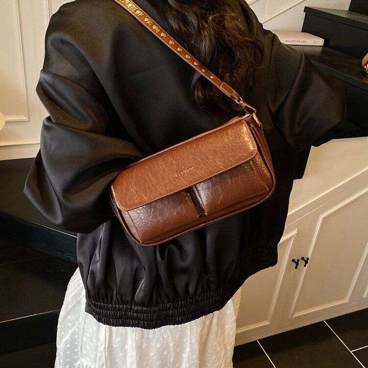 casual texture solid color commuting fashion underarm single shoulder rivet large capacity high-end feel bag