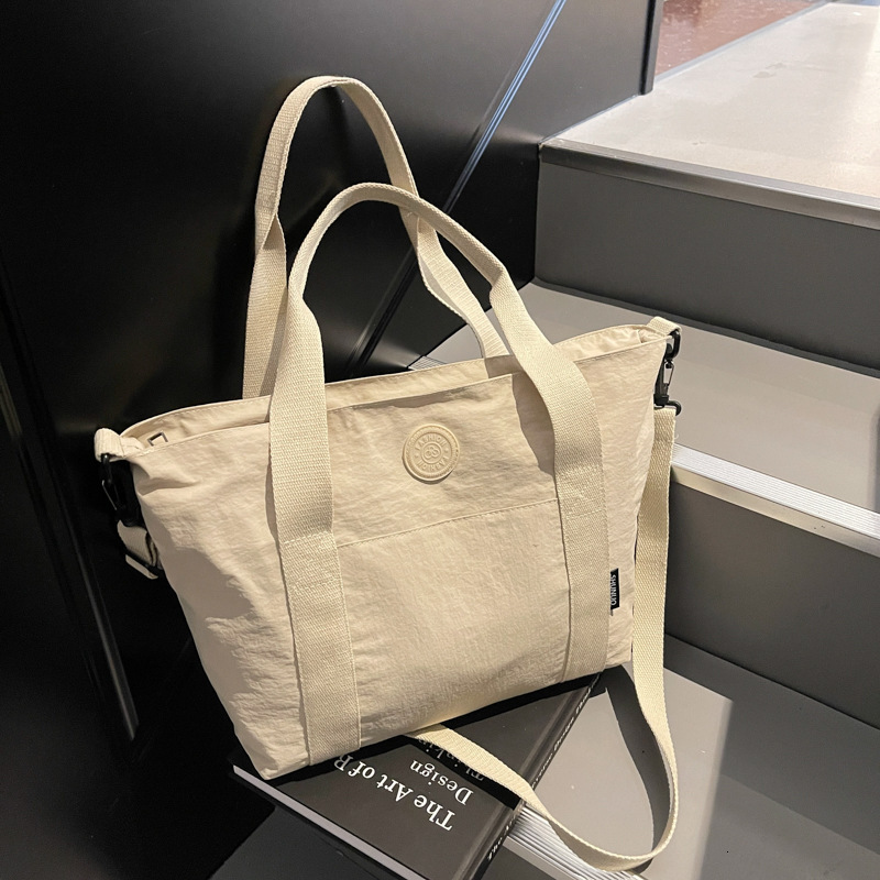 Large capacity canvas women's spring and summer versatile 2025 new crossbody cloth bag, casual student class tote bag