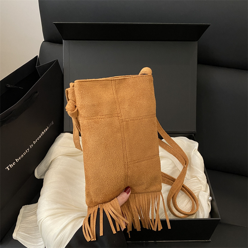 2025 Luxury Bag Suede Niche New Free Delivery Designer Bag Design New Women's Bohemian Style American Tassel Bag Frosted Crossbody