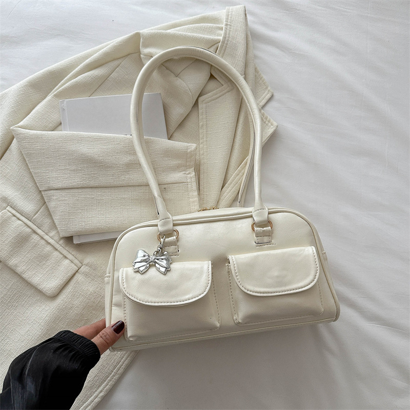American Fashion Handheld Bowling 2025 New Fashionable Versatile Shoulder High Beauty New Free Delivery Luxury Bag Designer Bag Casual Women's Ba