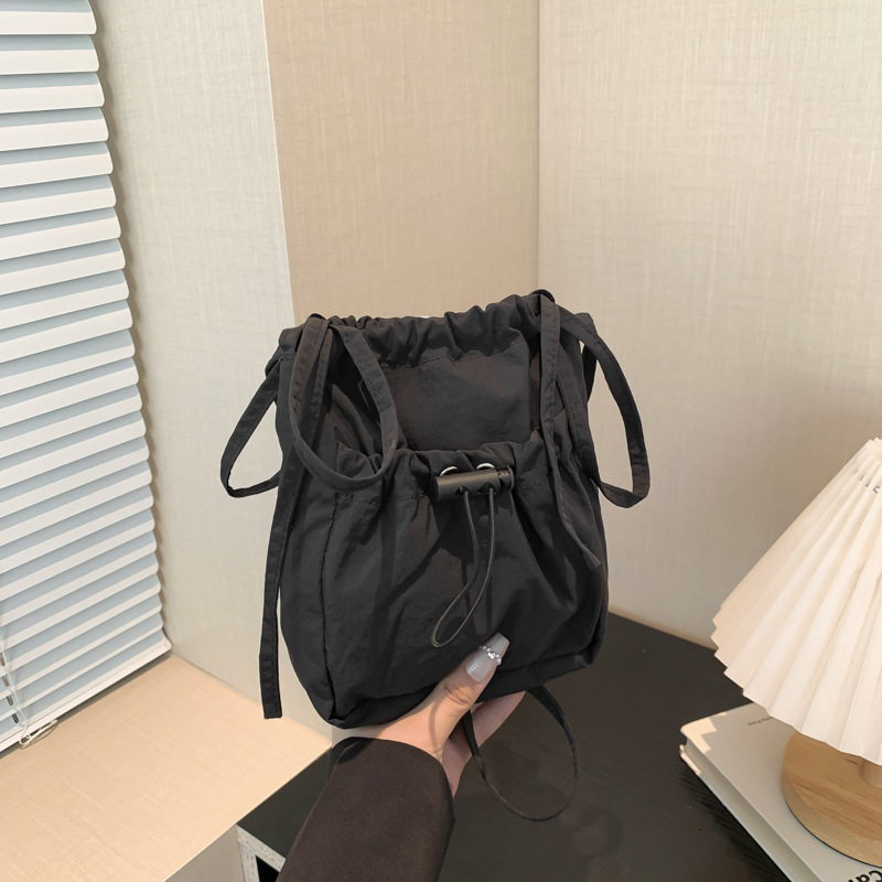 Free Delivery Designer Bag Simplified Korean Version Of Forest Style Small Shoulder Lightweight Nylon Phone 2025 New Lazy Pleated Drawstring Crossbody