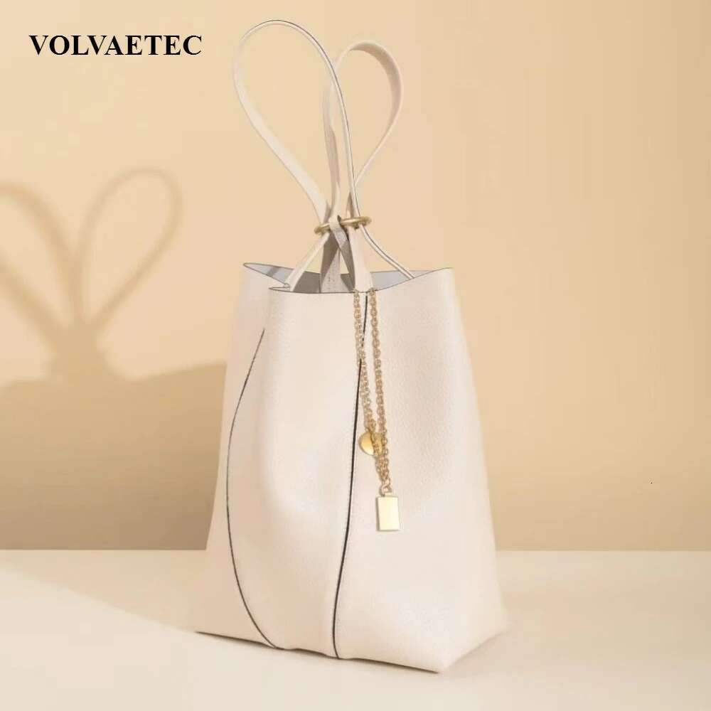 VOAETEC High Sense Fashion Trend 2025 Early Spring New Women's Leather Texture Clutch Underarm Shoulder Bag Metal Pendant