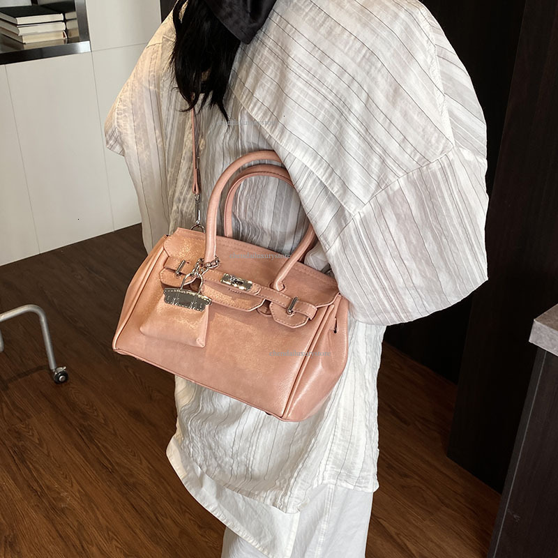 2025 Free Shipping Designer Women's Bag High-end Texture Large Capacity Handbag Fashionable Buckle Strap Single Shoulder Crossbody Bag Casual Com