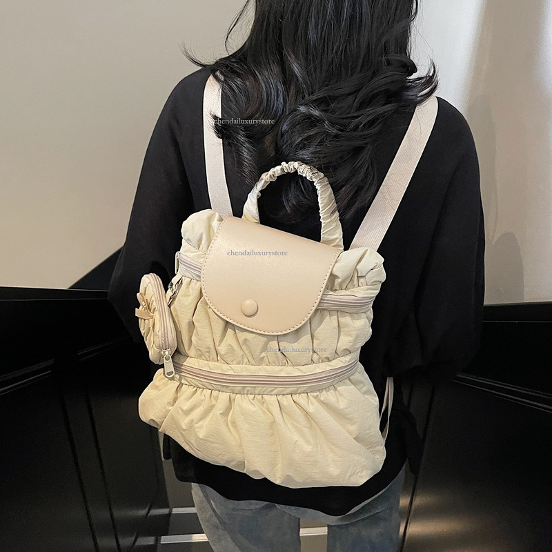 2025 Free Shipping Designer Bag Women's Backpack Sweet And Fashionable Pleated Skirt Handbag Campus Student Backpack Outdoor Travel Vacation Back