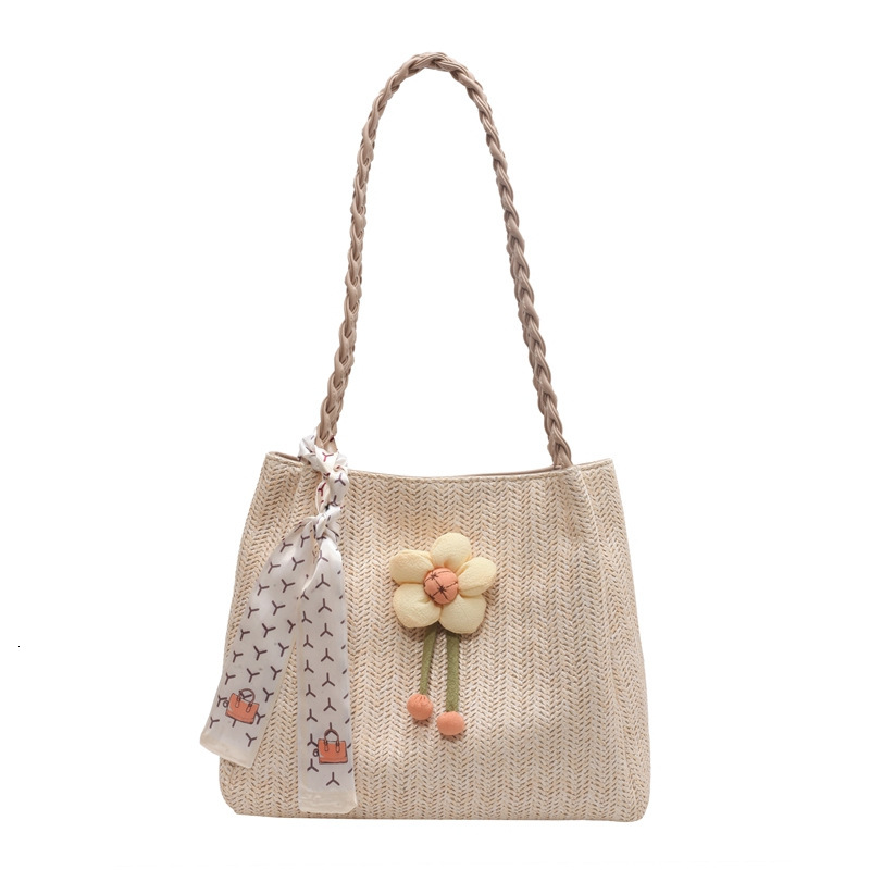 A new designer bag woven for women in the summer of 2025, featuring a large capacity seaside vacation single shoulder slanted transportation tote bag