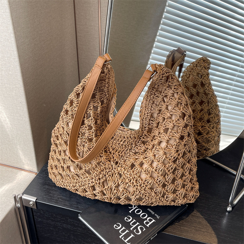 High quality new large capacity women's new summer beach designer vacation grass woven multifunctional retro versatile commuting shoulder bag arm