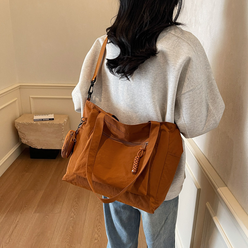 Lazy style large capacity canvas for women 2025 new fashion student class computer bag, one shoulder portable tote bag