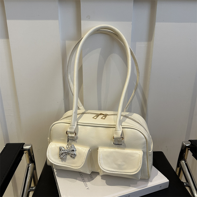 American Fashion Handheld Bowling 2025 New Fashionable Versatile Shoulder High Beauty New Free Delivery Luxury Bag Designer Bag Casual Women's Ba