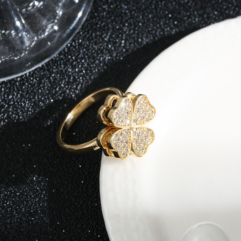 New Rotating Four Leaf Clover Open Ring with Female Design Sense, niche and stress relieving ring, fashionable