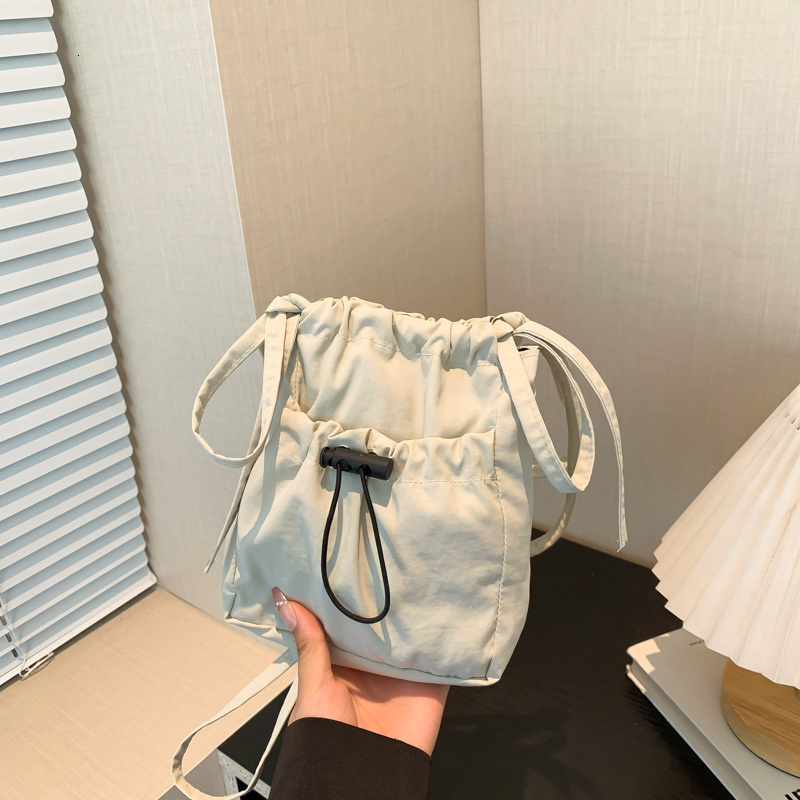 Free Delivery Designer Bag Simplified Korean Version Of Forest Style Small Shoulder Lightweight Nylon Phone 2025 New Lazy Pleated Drawstring Crossbody