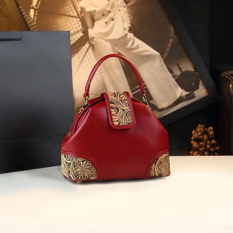 2025 New Fashionable Single Shoulder Foreskin Carving Niche Design Dumpling Handbag Atmospheric High-End Crossbody Bag