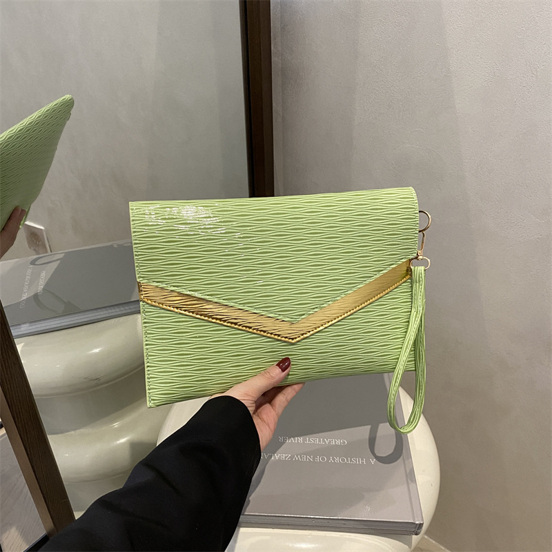 Luxury Bag Spring And Summer Handheld Envelope 2025 Western Korean Edition Personalized Fashion Casual New Free Delivery Designer Bag Style Color Cont