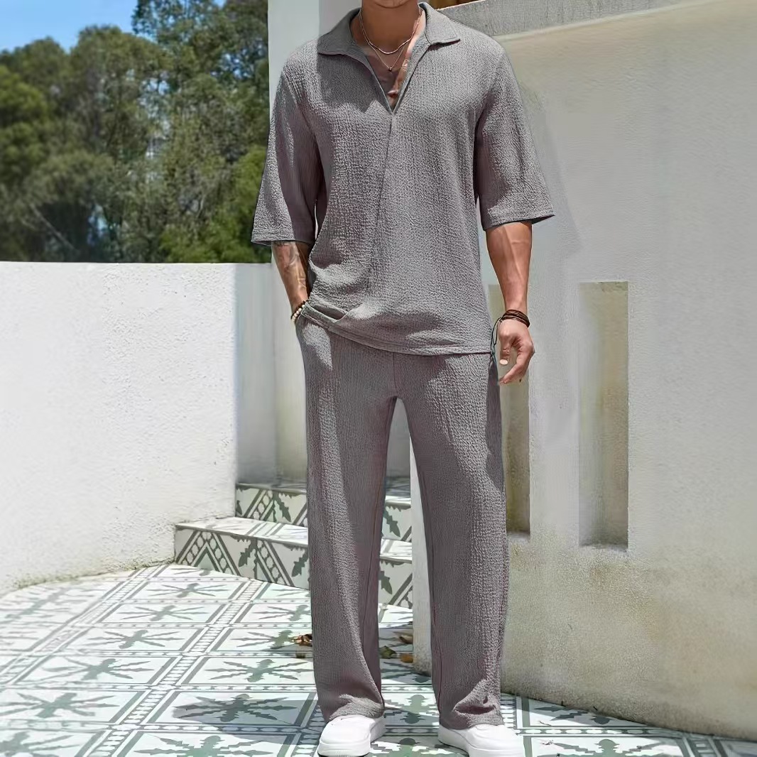 Trendy men's commuting two-piece set, including a solid-color short-sleeve shirt and long pants.