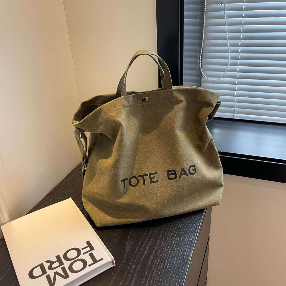 Thick canvas vintage tote high-end handbag commuting large capacity student backpack shoulder bag 2025 new style chic and elegant temperament